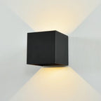 Black square wall light fixture on a gray wall