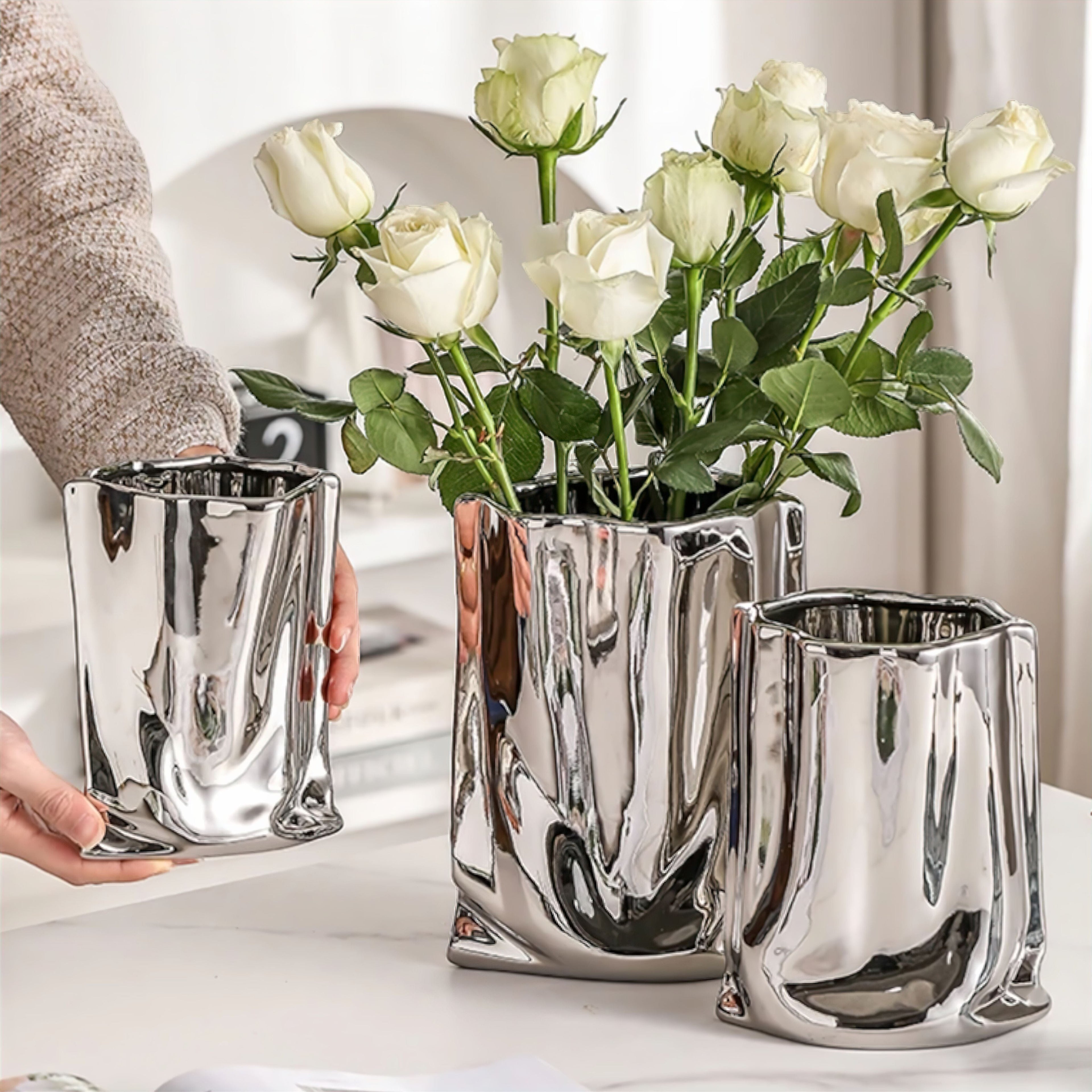 Modern Liquid Silver Vase – Elegant Decorative Centerpiece for Home Decor 1
